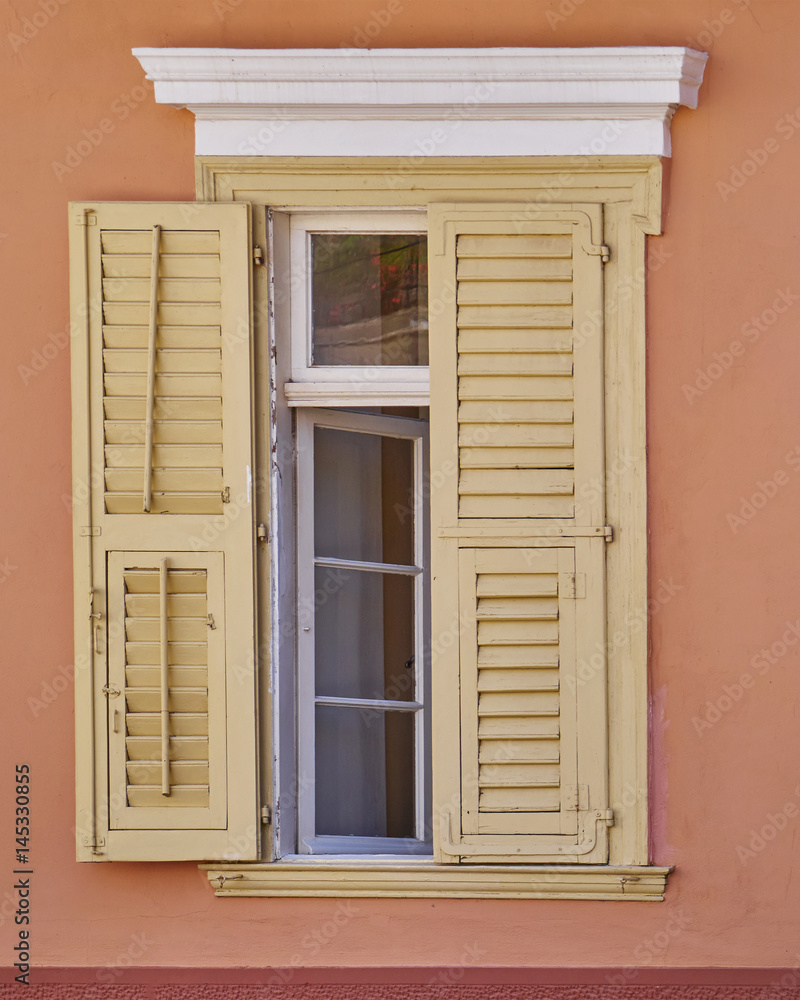vintage window house on colorful wall