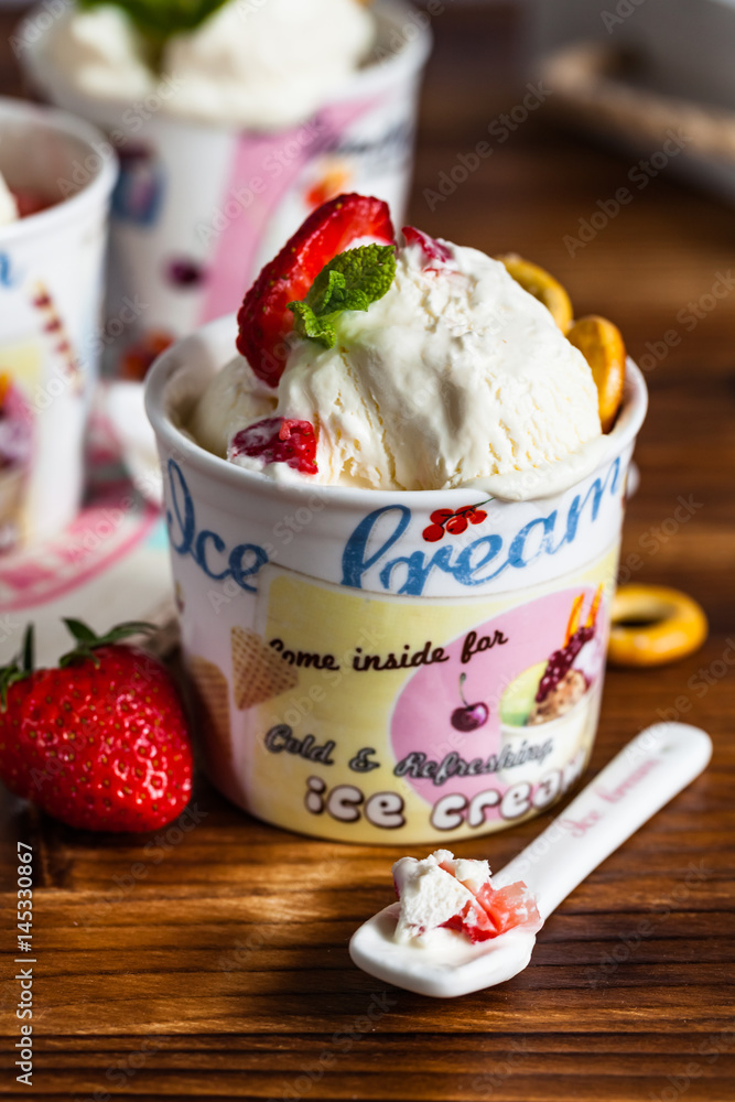 Ice cream in retro bowls on a wooden table. Backgrounds created for your text. Ice cream in retro bowls on a wooden table. Backgrounds created for your text.