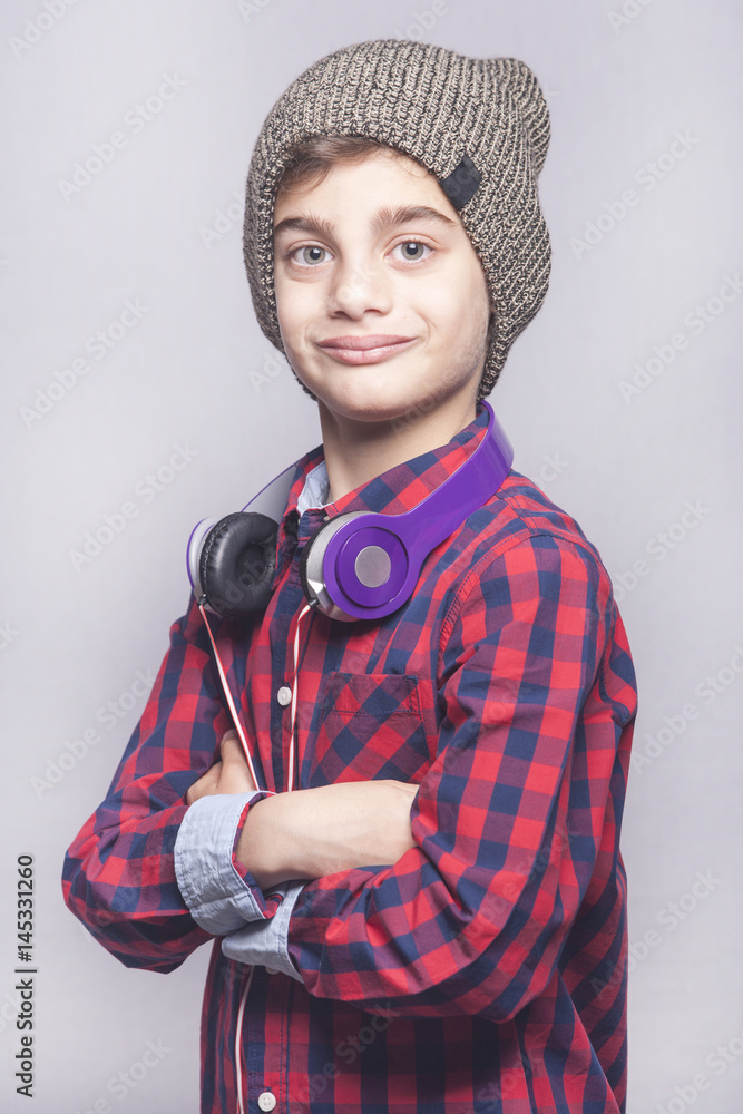 Portrait of a trendy little boy with headphones Portrait of a trendy little boy with headphones
