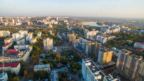 Ufa city at sunset in center. Aerial view