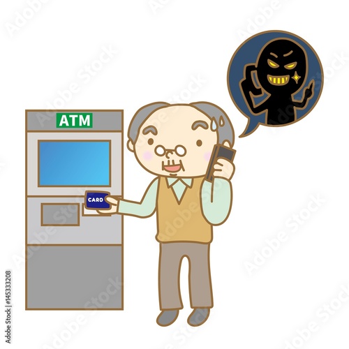 ATM前で電話をするシニア男性