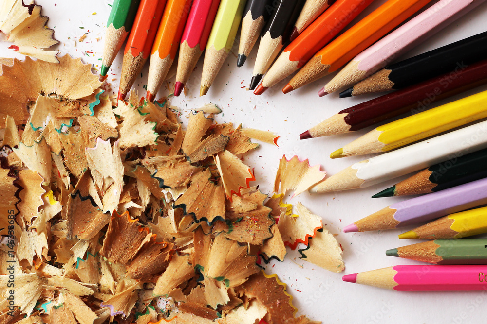 Colored pencils and sawdust, school supplies Colored pencils and sawdust, school supplies
