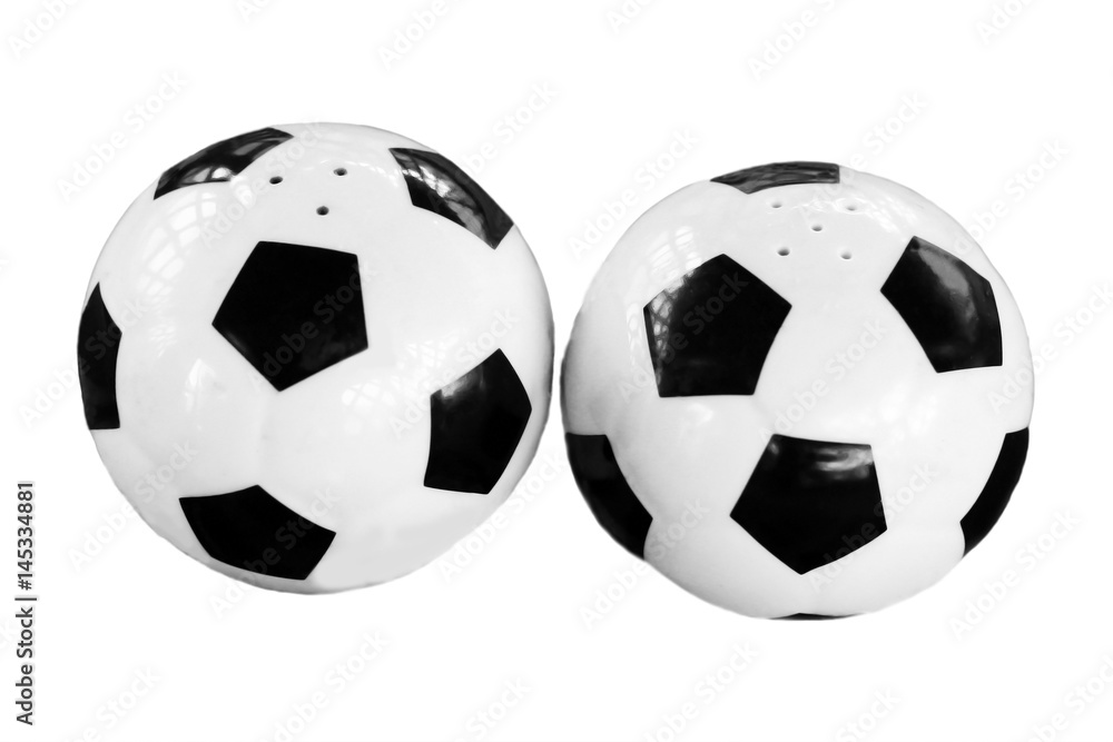 Two soccer balls salt and pepper, kitchen utensils Two soccer balls salt and pepper, kitchen utensils