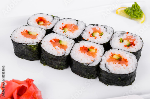Wallpaper Mural Asia. Rolls with salmon (red fish) on a white plate on a white background Torontodigital.ca
