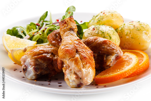 Roast drumsticks with potatoes