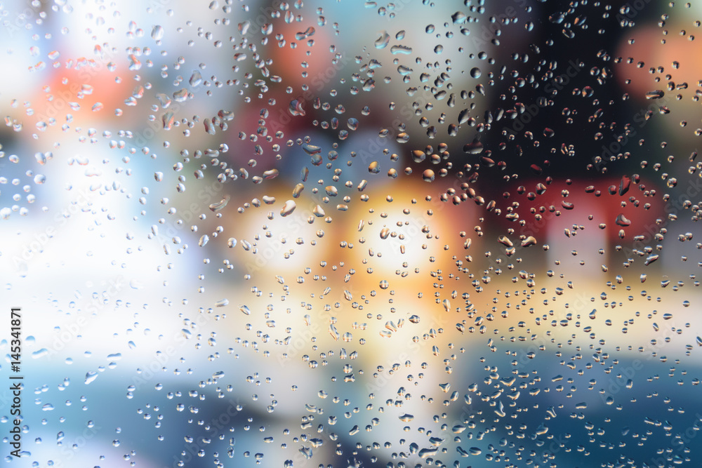 Raindrops on a car glass