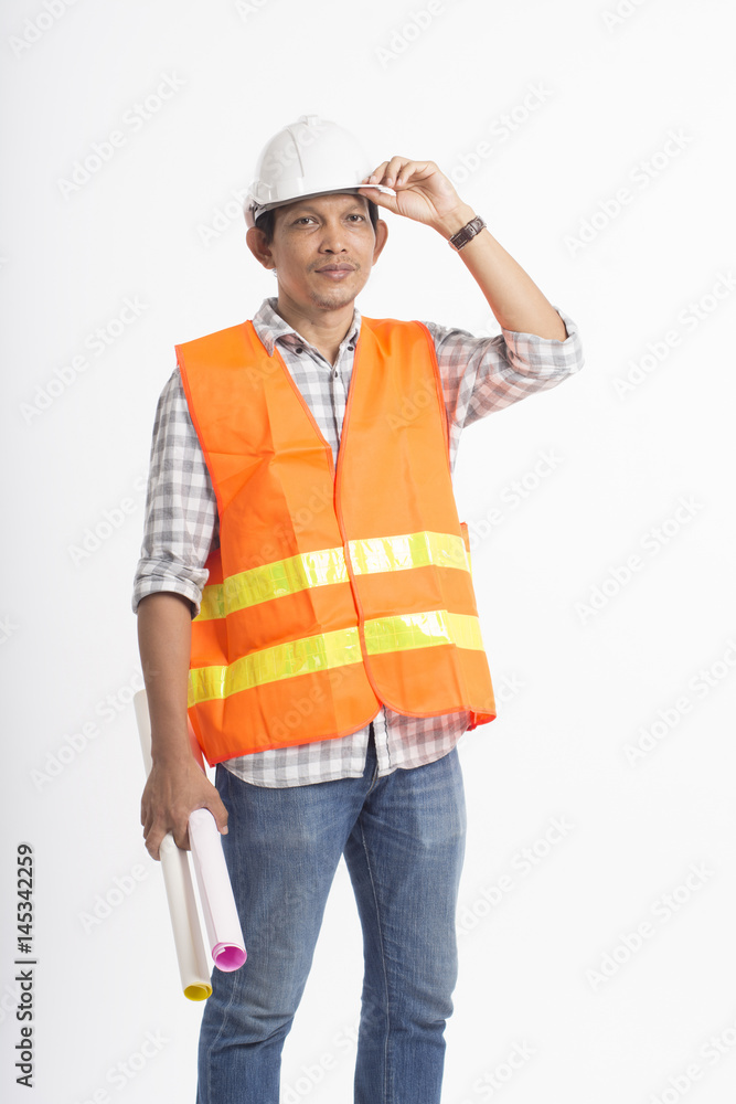 Asian engineer holding paper rolls, wearing helmet and vests, standing on white background