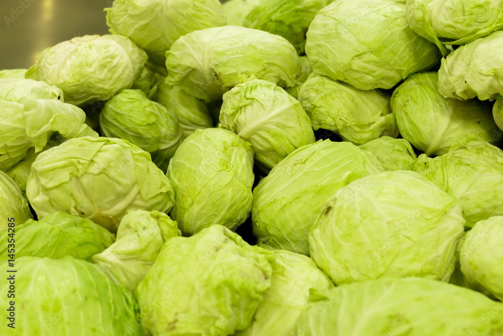 Green fresh organic cabbage at farmers market on a tropical Bali island, Indonesia. Green fresh organic cabbage at farmers market on a tropical Bali island, Indonesia.