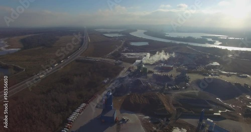 Concrete plant near a big road. Aerial. photo