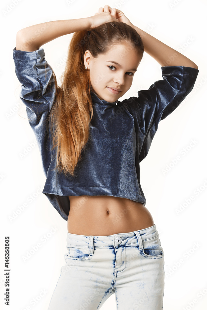 Young cute teen girl posing in studio on white background. Teen girl  smiling. Stock Photo | Adobe Stock