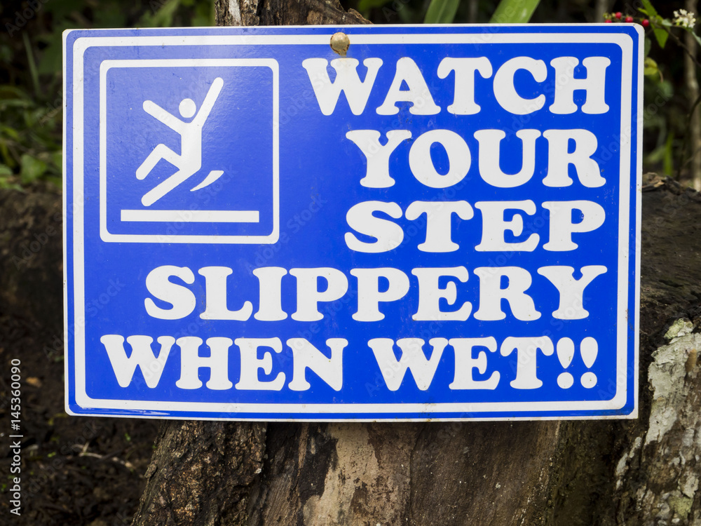 Watch your step slippery when wet sign