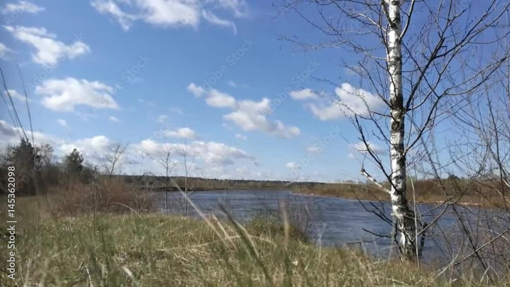 Time-lapse. Clouds are running over the river. Time-lapse. Clouds are running over the river.