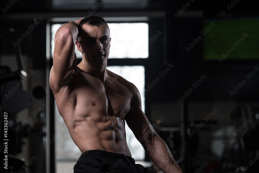 Healthy Man Showing Abdominal Muscle Healthy Man Showing Abdominal Muscle