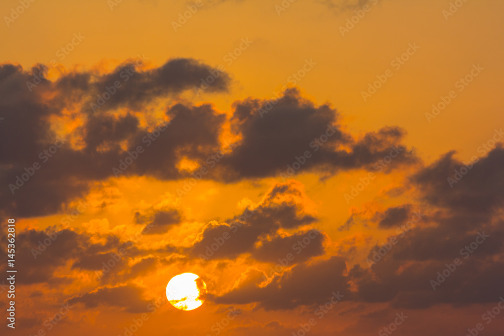 
bright tropical sunrise with clouds in the sky