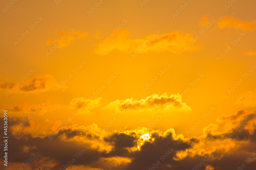 bright tropical sunrise with clouds in the sky
