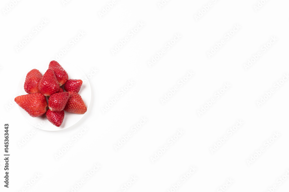 High angle view on Japanese strawberries on white background. High angle view on Japanese strawberries on white background.