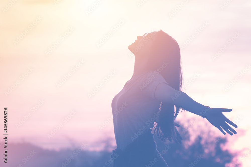 Young woman relaxing in summer sunset sky outdoor. People freedom style. - obrazy, fototapety, plakaty 