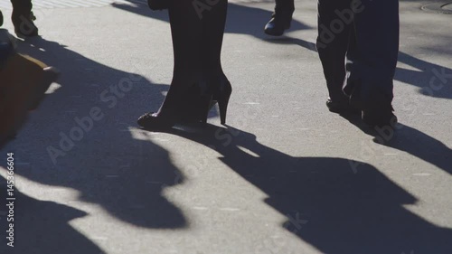 Wallpaper Mural Woman In High Heel Shoes Appearing And Standing In A Crowd Of Passerby Shoes And Shadows On A Shopping Main Street Torontodigital.ca