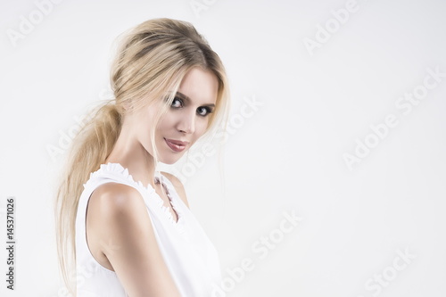 the girl in a white blouse on a white background