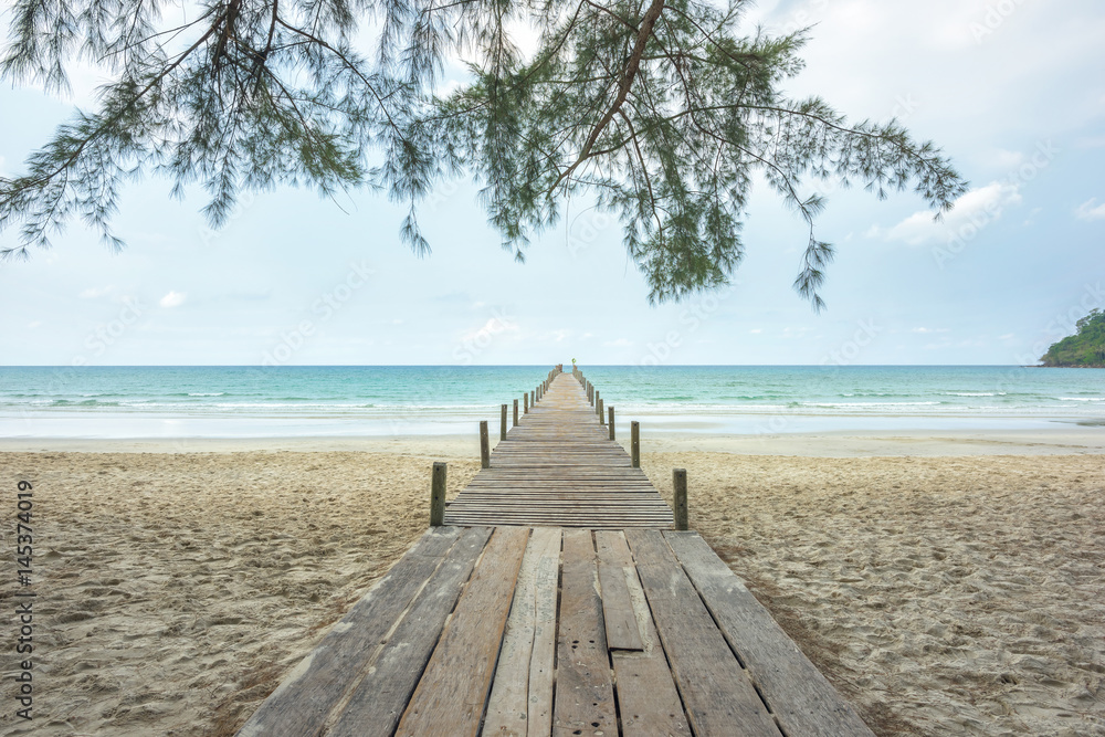 Wooden bridge to the ocean