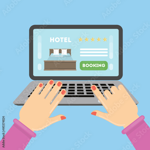 Online hotel booking. Female hands typing on the laptop to book a roomin the hotel.