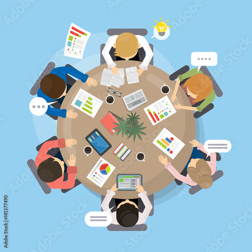 Office table with team and laptops top view. Round table