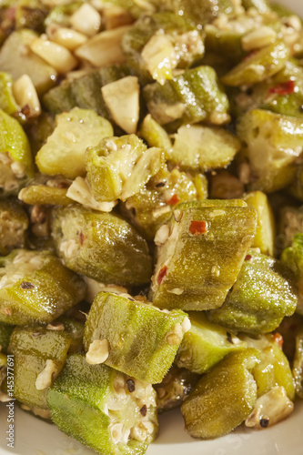 Slika na platnu cut okra and garlic pan fried in olive oil