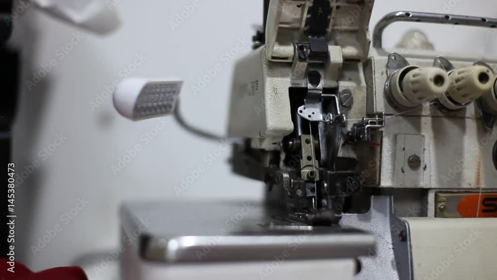 Closeup shot of sewing machine in slow motion. Closeup shot of sewing machine in slow motion.