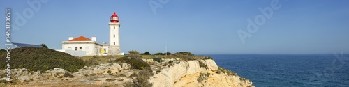 panorama with lighthouse and blue sea