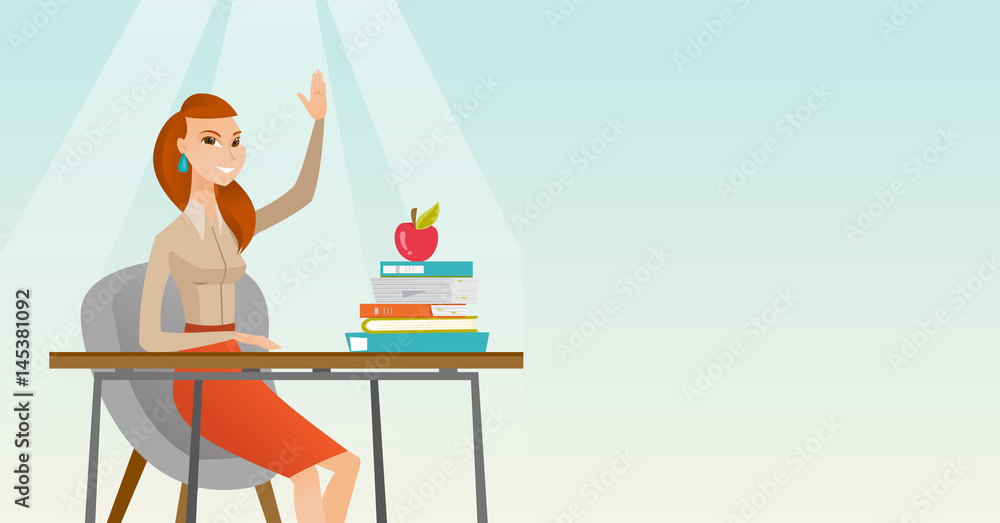 Fototapeta premium Student raising hand in class for an answer.