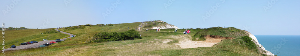Beachy Head is a chalk headland in East Sussex, England. It is situated close to Eastbourne, immediately east of the Seven Sisters.