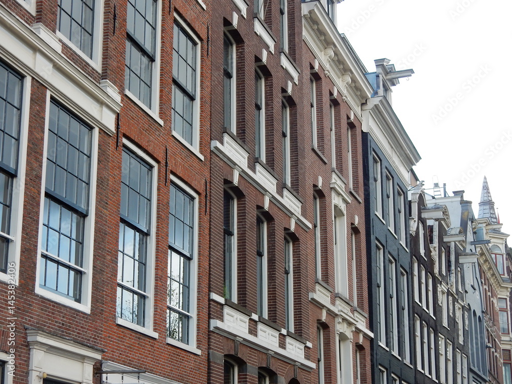 historic merchant buildings along Amsterdam canals, Netherlands