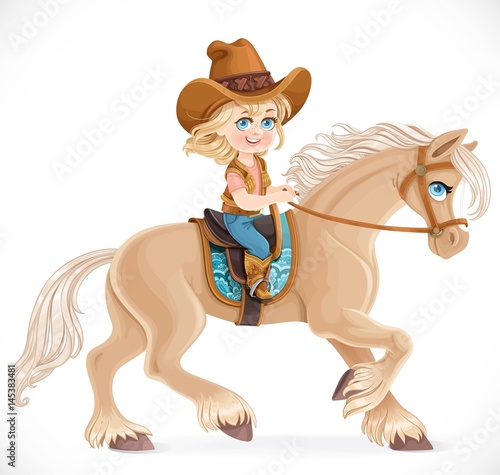 Cute little girl in a cowboy suit riding a horse isolated on a white background