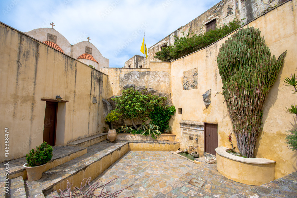 Preveli monastery courtyard with the church of Saint John, Rethimno, Crete, Greece.