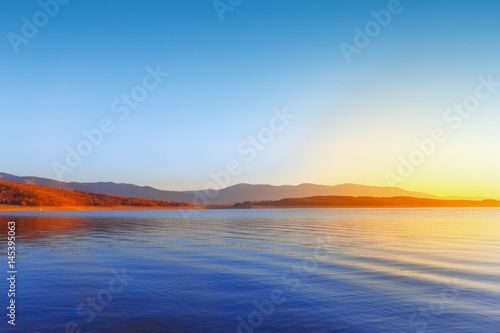 Beautiful sunrise over Tundzha river in Bulgaria.  © Feel good studio