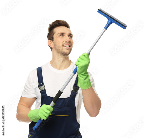Young window cleaner on whi...