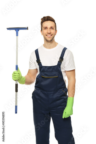 Young window cleaner on whi...