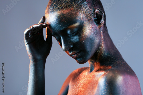 Young woman with creative b...