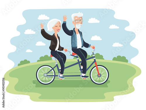 Elderly couple riding a bicycle photo