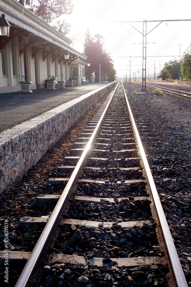 Fototapeta premium railway line at an old train station