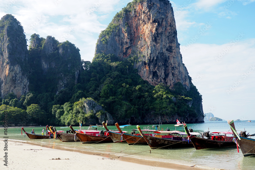 Fototapeta premium longtail boats on railay beach, krabi, thailand