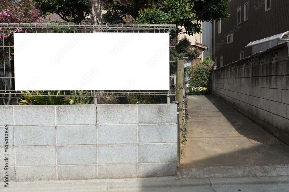 Large blank billboard on a street wall, banners with room to add your own text Large blank billboard on a street wall, banners with room to add your own text