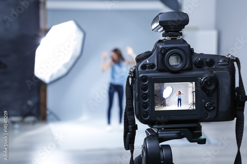 Professional camera in stud...