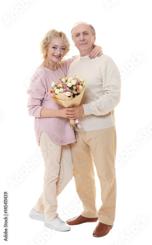 Happy senior couple with bo...