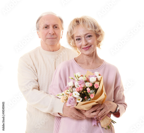 Happy senior couple with bo...