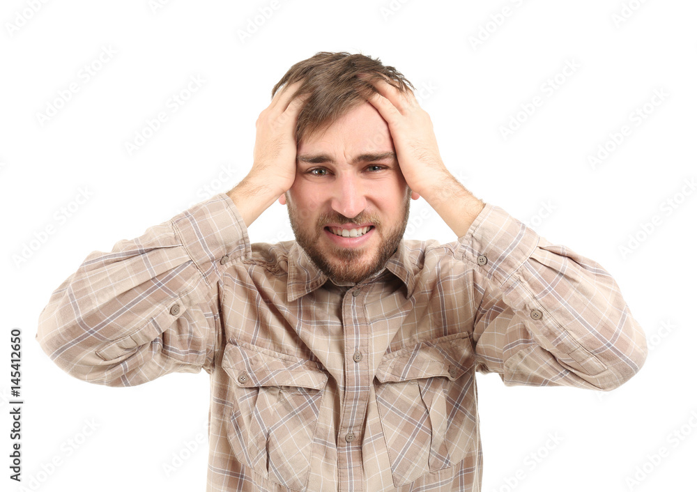 Young man suffering from headache on white background Young man suffering from headache on white background