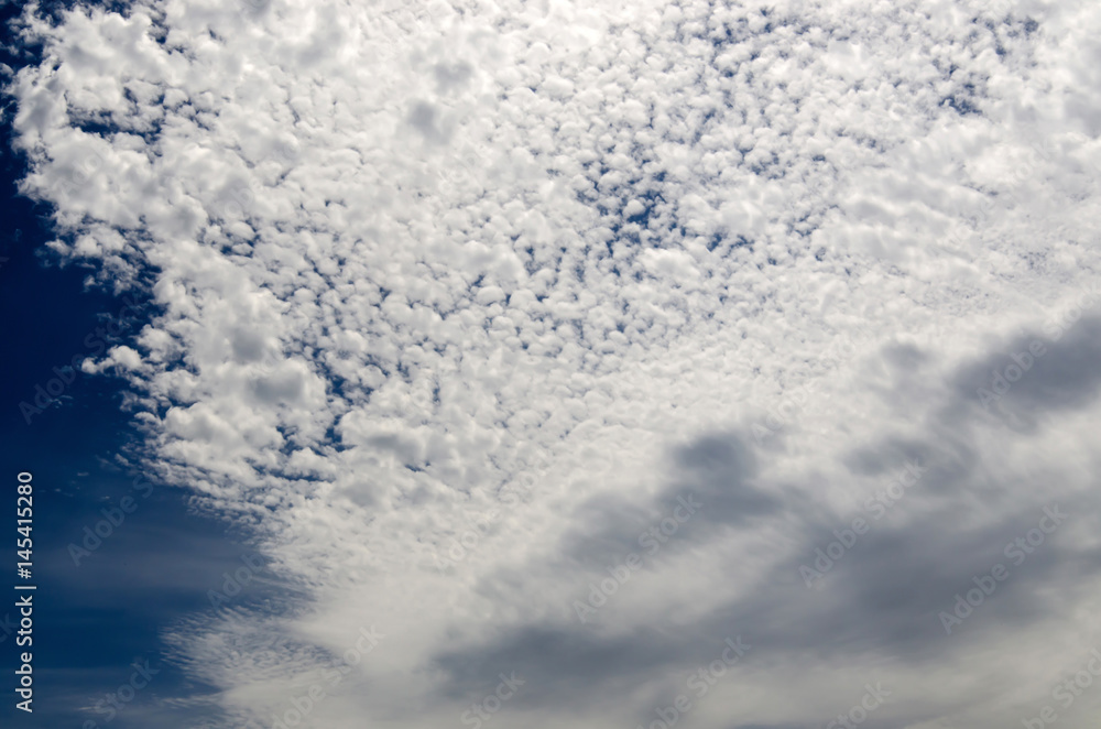 Fototapeta premium Blue sky with white cloud and partial dark clouds. Sky cloud.