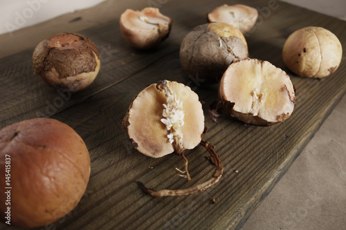 Avocado nuts on wooden background