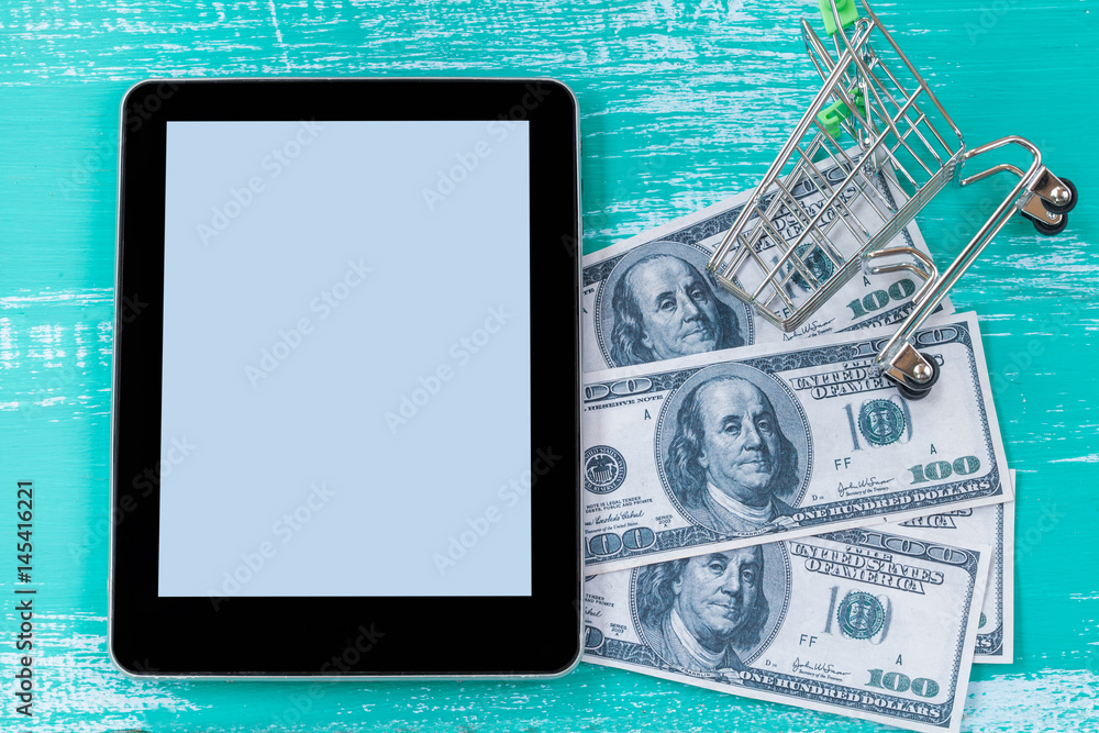 Fototapeta premium make money by tablet or mobile phone ,concept business on line.