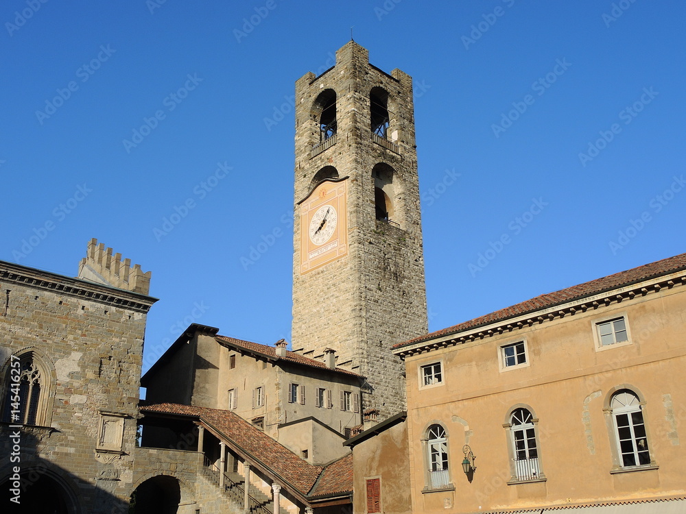 Bergamo - Old city (Città Alta). Landscape on the ancient Administration Headquarter called Palazzo della Ragione and the clock tower called Il Campanone